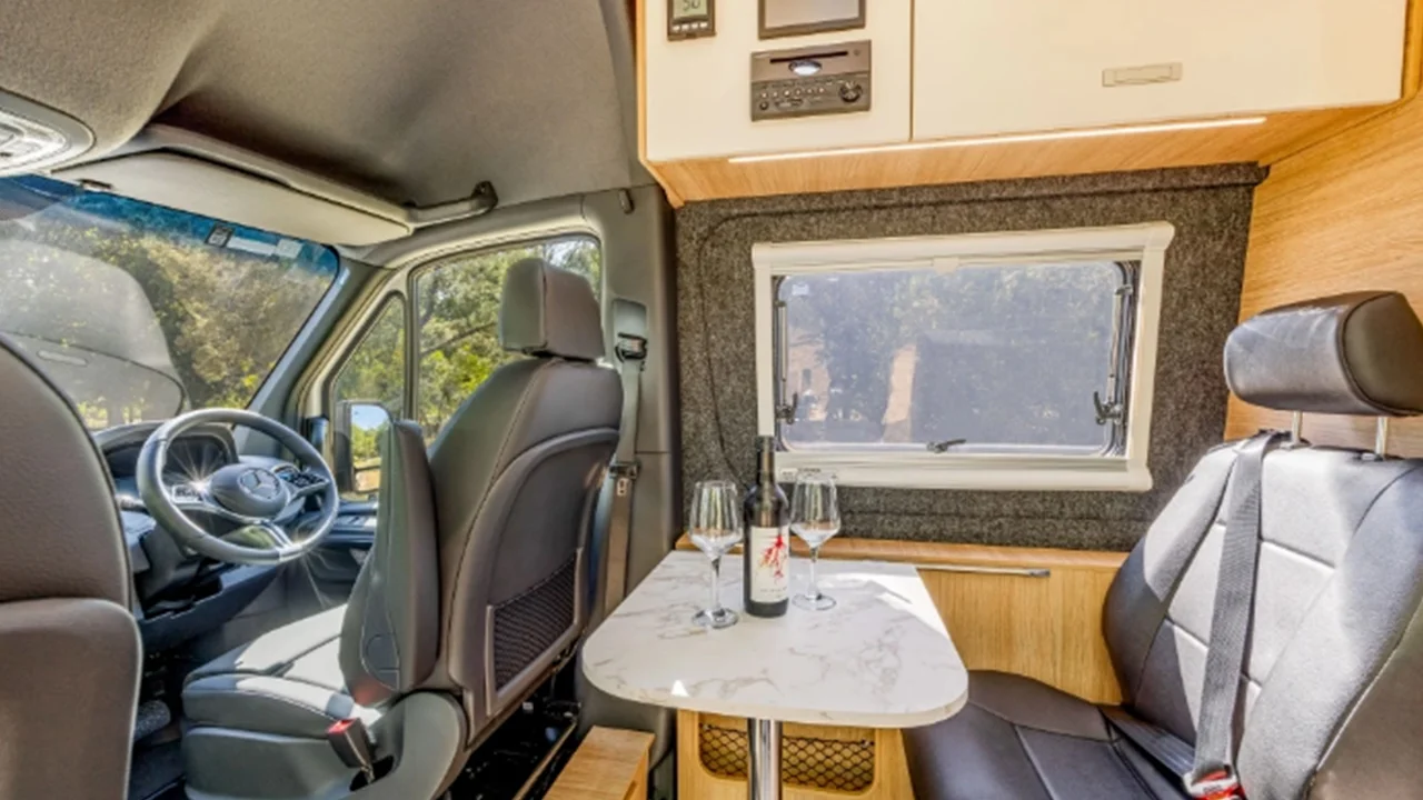 Let's Go Jayco Adventurer - 2 Berth - dining table with wine