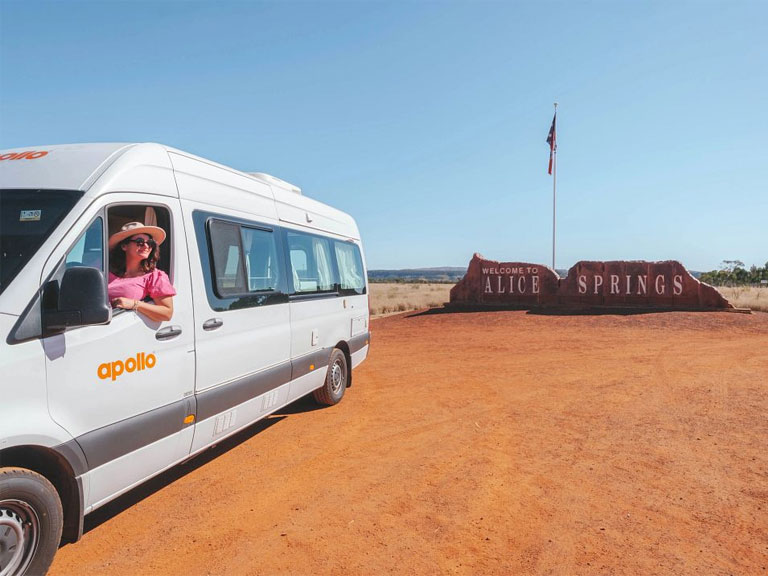 Apollo Euro Plus campervan hire at the Alice Springs welcome sign