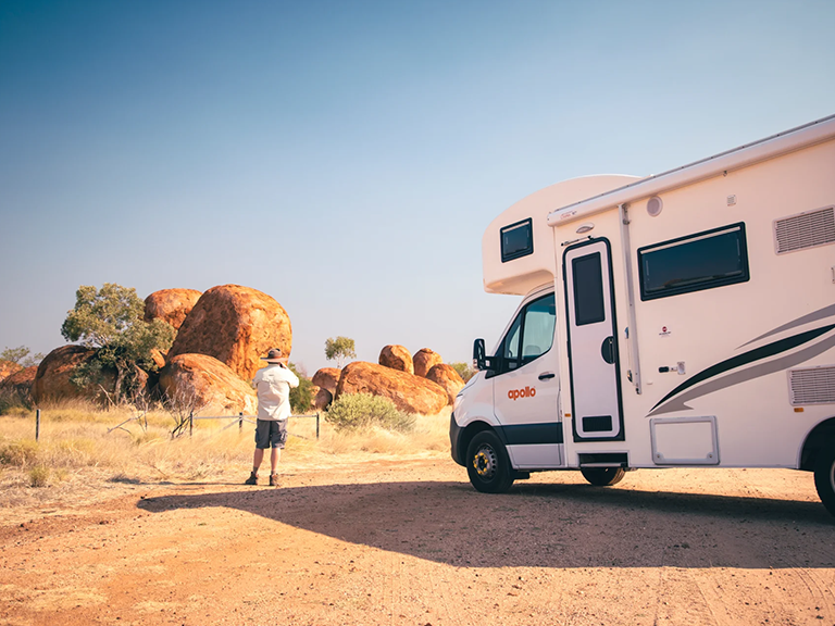 Motorhome rental stopped at Karlu Karlu (Devils Marbles) near Alice Springs