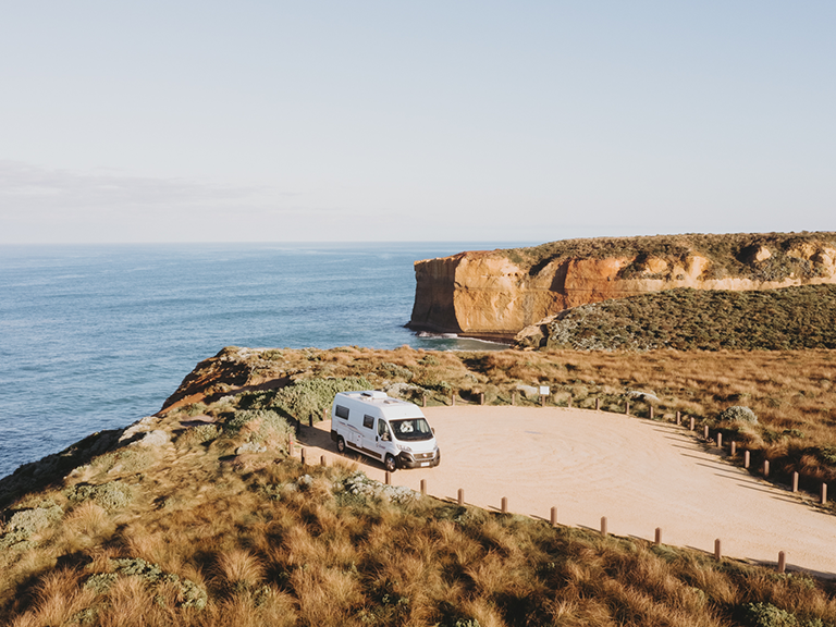 Campervan hire vehicle parked at The Grotto lookout on the Great Ocean Road in Victoria