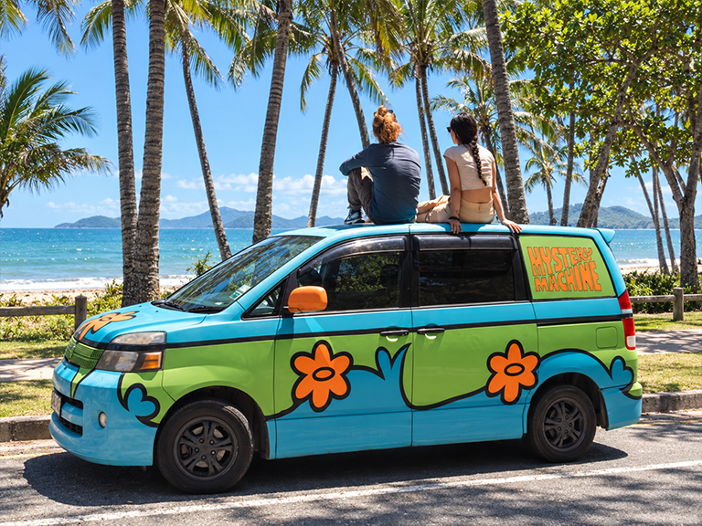 Mystery Machine campervan hire vehicle parked on Williams Esplanade at Palm Cove in Queensland