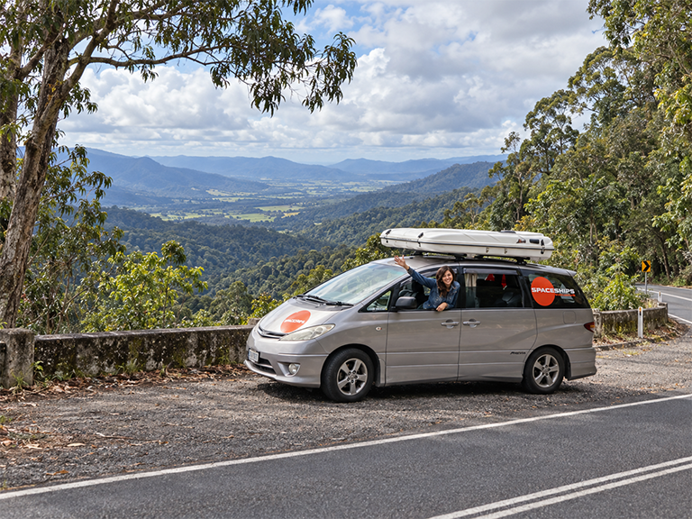 Spaceships campervan hire vehicle at a Gillies Highway viewpoint overlooking the Atherton Tablelands in Far North Queensland