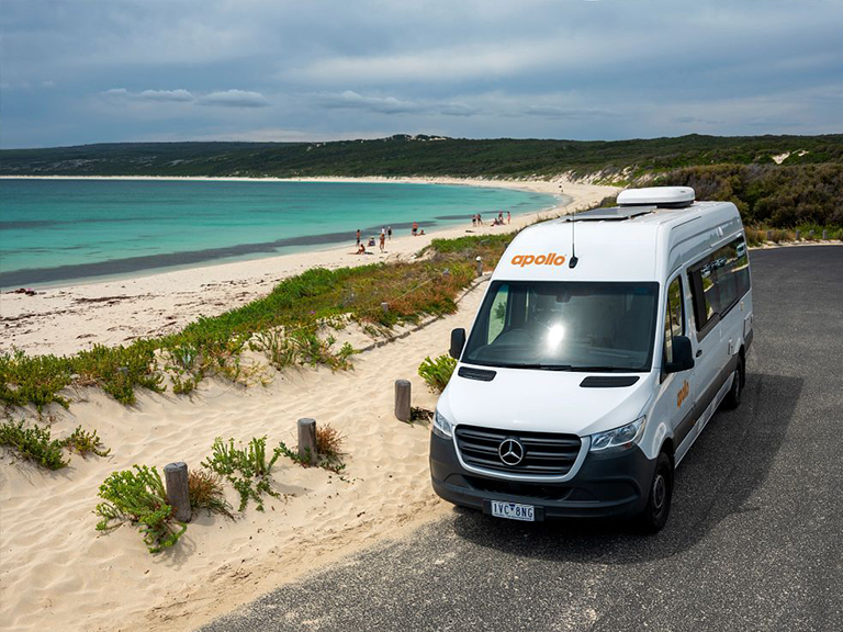 Apollo campervan hire vehicle parked beside a beach in the Margaret River region of Western Australia